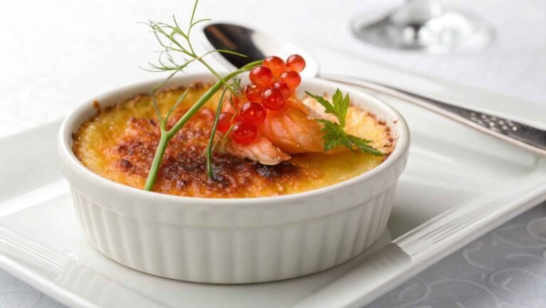 A Gourmet Crab Brûlée Recipe Served In A Delicate White Ramekin