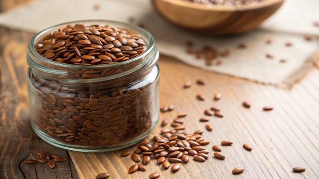 A Close Up View Of Flaxseeds In A Glass Jar For Protein Powder In Cookies